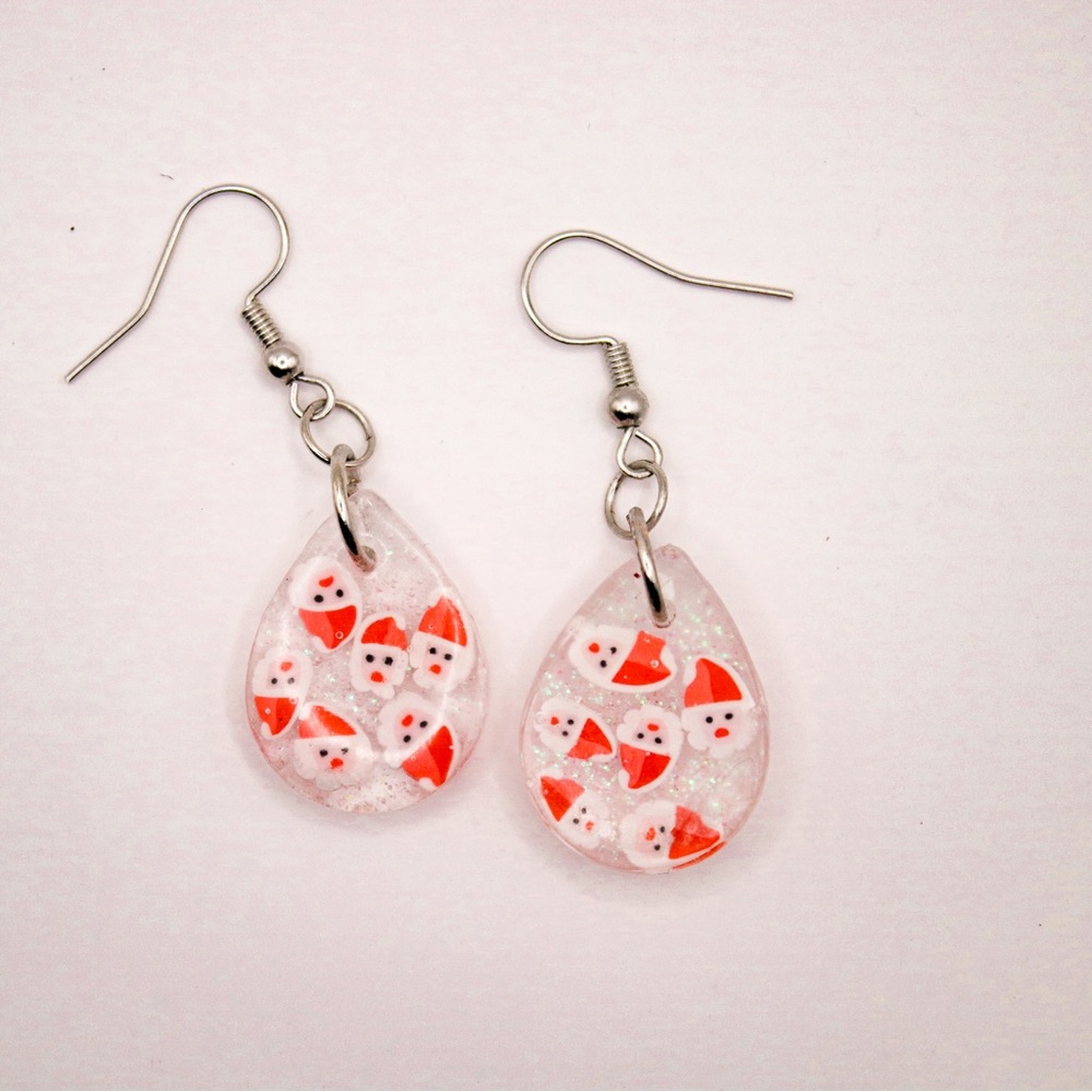 Resin Earrings with Santa Claus Sprinkles and glitter. 1/2” Dangle earring